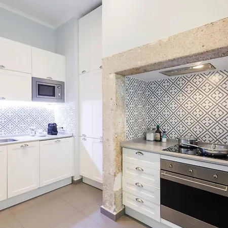 Проживание в семье In Shared In The Downtown Near Praca Da Figueira